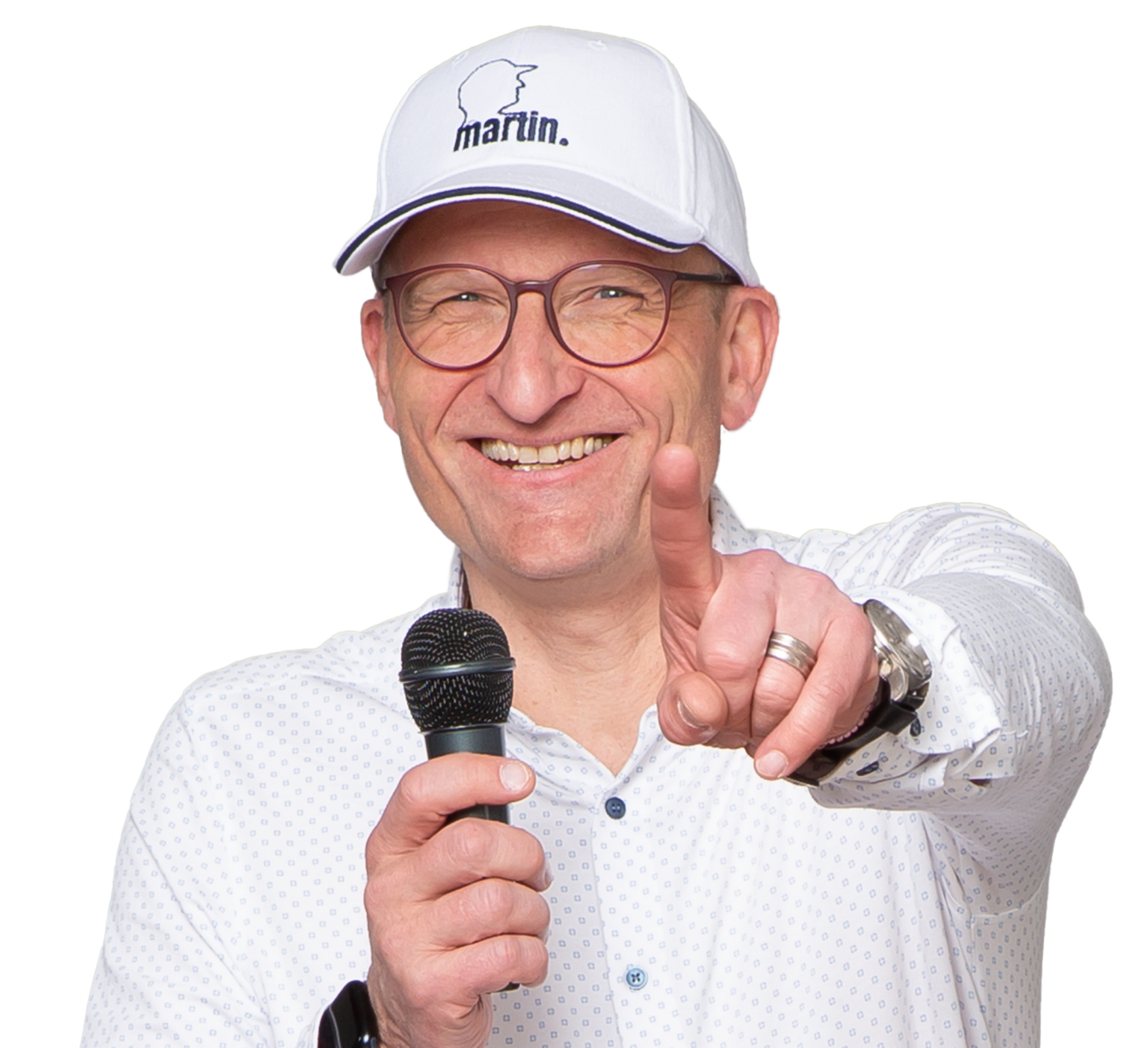 Martin Grau mit Mikrofon, freigestelltes Porträt